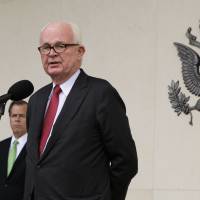 Stephen Bosworth, the U.S. special representative for North Korea policy, speaks after talks with North Korean delegates in Geneva in October 2015. Behind him is fellow U.S. negotiator Glyn Davies. | U.S. STATE DEPARTMENT