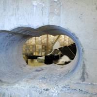 Robbers drilled this hole through the concrete wall of a vault during the Hatton Garden heist in London. | REUTERS