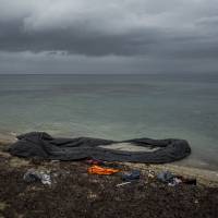 A dinghy is left behind on a shore close to the town of Mytilene, shortly after dozens of refugees and migrants used it to cross a part of the Aegean sea from Turkey to the Greek island of Lesbos, Tuesday. | AP