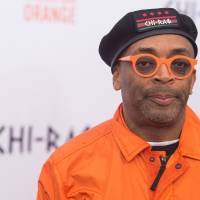 Spike Lee attends the Dec. 1 premiere of “Chi-Raq” at the Ziegfeld Theatre in New York. Calls for a boycott of the Academy Awards are growing over the Oscars’ second straight year of mostly white nominees, as Spike Lee and Jada Pinkett Smith each said Monday, they will not attend this year’s ceremony. Spike Lee to snub 'lily white' Oscars as boycott calls mount over lack of nominee diversity