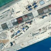 Chinese-built infrastructure is seen Jan. 8 on the northwest side of Subi Reef in the disputed South China Sea. | CSIS/AMTI/DIGITALGLOBE/REUTERS