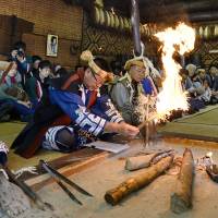 Ainu from across Hokkaido get together at the Ainu Museum in the town of Shiraoi on Nov. 1 for a harvest thanksgiving ceremony. | KYODO