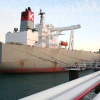 A tanker filled with crude oil for exports apparently to Japan is docked at a port in Iran\'s Kharg Island on Tuesday. | IRAN\'S MINISTRY OF PETROLEUM / KYODO
