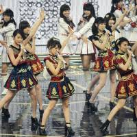Idol group AKB48 performs during NHK\'s annual \"Kohaku\" music competition on Thursday. Viewership during the end-of-the-year TV show plummeted to an all-time low of 39.2 percent. | KYODO