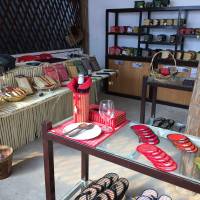 Various handicrafts made by Cambodian women and children are sold at a store near the Community Factory in northwestern Cambodia. | COURTESY OF KAMONOHASHI PROJECT