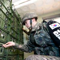 A South Korean soldier operates loudspeakers just south of the demilitarized zone separating the two Koreas, in Yeoncheon, South Korea, on Friday. | REUTERS