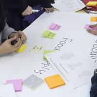 Students make a rough draft of a poster for their presentation. | MASANORI DOI