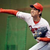 Carp ace Kenta Maeda has agreed to sign with the Dodgers according to a report by CBS Sports. | KYODO