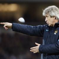 Despite his success at the helm, Manchester City manager Manuel Pellegrini could be dismissed and replaced by Pep Guardiola. | AP