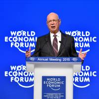 Klaus Schwab, founder and executive chairman of the World Economic Forum, speaks during a plenary session at the congress center during the WEF annual meeting in Davos on Jan. 21, 2015. | WEF
