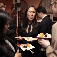 Guests mingle while enjoying Japanese food. | JAPAN NIGHT ORGANIZATION COMMITTEE
