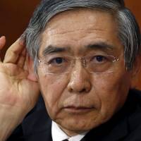 Bank of Japan Gov. Haruhiko Kuroda attends a news conference at BOJ headquarters in Tokyo in January. | REUTERS