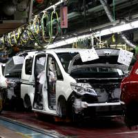 Nissan Motor Co. vehicles are assembled at a plant in Kanda, Fukuoka Prefecture, last July. | BLOOMBERG