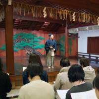 Noh news is good news: Men and women attend a noh session at a theater in Osaka. | KYODO