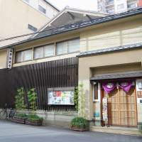Behind the door: Yamamoto Noh Gakudo in Osaka was built more than 90 years ago. | KYODO
