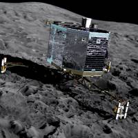 This file picture released by the European Space Agency on Dec. 20, 2013, shows an artist\'s impression of Rosetta\'s lander Philae (front view) on the surface of comet 67P/Churyumov-Gerasimenko. | AFP-JIJI