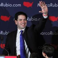Republican presidential candidate Sen. Marco Rubio acknowledges the crowd in Manchester, New Hampshire, on Tuesday. | AP