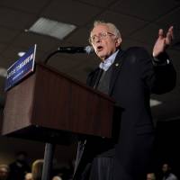 U.S. Democratic presidential candidate Bernie Sanders speaks at a town hall campaign event in Iowa on Jan. 23. | REUTERS