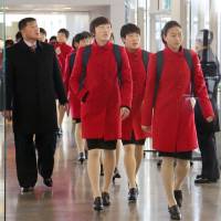 Members of the North Korean women\'s soccer team arrive at Kansai International Airport in Osaka on Thursday. | KYODO