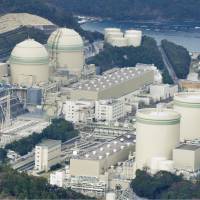 The No. 4 reactor (second from left) at the Takahama nuclear power plant in Fukui Prefecture shut down Monday. | KYODO