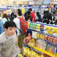 The Bangkok branch of animate, an anime and manga retail chain, which opened on Saturday, is seen crowded with shoppers. | KYODO