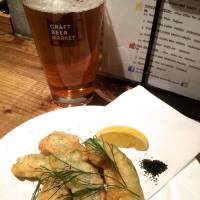 Standouts on the appetizer menu include avocado fritters garnished with Hawaiian black charcoal salt. | ROBBIE SWINNERTON