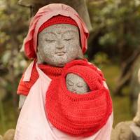 Peaceful protection:  An ojizo statue sits in Horinji Temple grounds. | KIT NAGAMURA