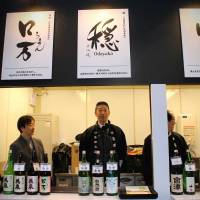 Yasuhiko Niida (center) from Odayaka, an organic brand of sake. | MONICA IRELAND