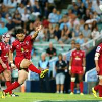 The Reds\' Ayumu Goromaru kicks a penalty against the Waratahs in Sydney on Saturday. | AP