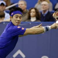 Kei Nishikori plays a shot during his Memphis Open semifinal win over Sam Querrey on Saturday. | AP