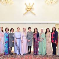 The Society of Wives of Arab Ambassadors and Heads of Missions in Japan (SWAAJ) hosted a luncheon in honor of Akie Abe (center), Prime Minister Shinzo Abe\'s wife, at the Oman ambassador\'s residence in Tokyo on Feb. 9. Abe was joined by SWAAJ President, Jamila Al-Suwaidi (Qatar, fifth from left); Vice President Maali Siam (Palestine, fifth from right); and (from left) Maha Mohamed (Sudan); Utako Arrour (Morocco); Keiko Shimazaki, wife of the Foreign Ministry\'s Chief of Protocol; Abeer Aisha (Oman); Jamilah Al-Otaibi (Kuwait); Shifa Haddad (Jordan); Wided Darragi (Tunisia), and Jamila Al-Gunaid (Yemen). During the luncheon, Abe was treated to a fashion show, where models wore traditional clothing from the Arab world. | MIKI OSHITA