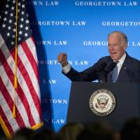 Vice President Joe Biden speaks at Georgetown Law School in Washington Thursday. Biden is pointing to his years as Senate Judiciary Committee chairman to cast Republicans\' election-year Supreme Court blockade as a dangerous new escalation of partisanship. In a speech at Georgetown Law School, Biden, took credit for moving eight Supreme Court nominees through the committee and to a vote on the Senate floor. | AP