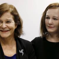 NTU Professor Thalmann and a humanoid that she and her team created take questions during an interview at Nanyang Technological University\'s Institute of Media Innovation in Singapore. | REUTERS