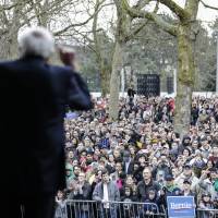 Democratic presidential candidate Sen. Bernie Sanders speaks to a crowd on March 20 ahead of a campaign rally in Seattle. | AP