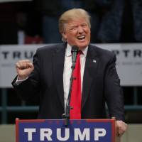 U.S. Republican presidential candidate Donald Trump gestures as he speaks during a campaign event in Concord, North Carolina, Monday. | REUTERS