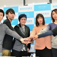 Members of citizens\' groups announce Monday in Osaka the launch of a coalition that includes the Kansai branch of Students Emergency Action for Liberal Democracy (SEALDs). | KYODO