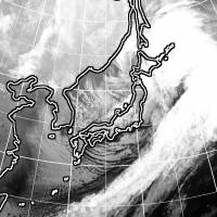 A satellite image taken at 11 p.m. Monday shows a big low-pressure system near Hokkaido. | KYODO
