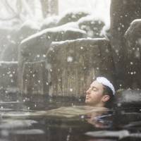 The number of foreign tourists coming to Japan is increasing, and \"with that change, we hope they can fully enjoy onsen in Japan,\" a Japan Tourism Agency official said. | ISTOCK