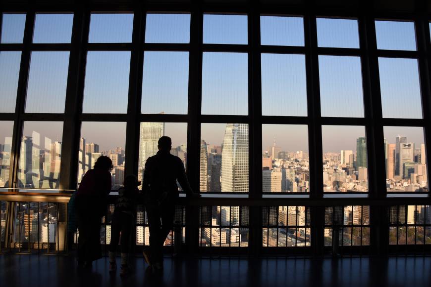 Tourists take in the view from the observation deck of Tokyo Tower last Thursday.