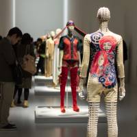 Tattoo: A cotton jumpsuit from Issey Miyake\'s 1970/71 spring/summer collection is seen in an installation view from \"Miyake Issey Exhibition: The Work of Miyake Issey\" at The National Art Center, Tokyo. | JOHN L. TRAN