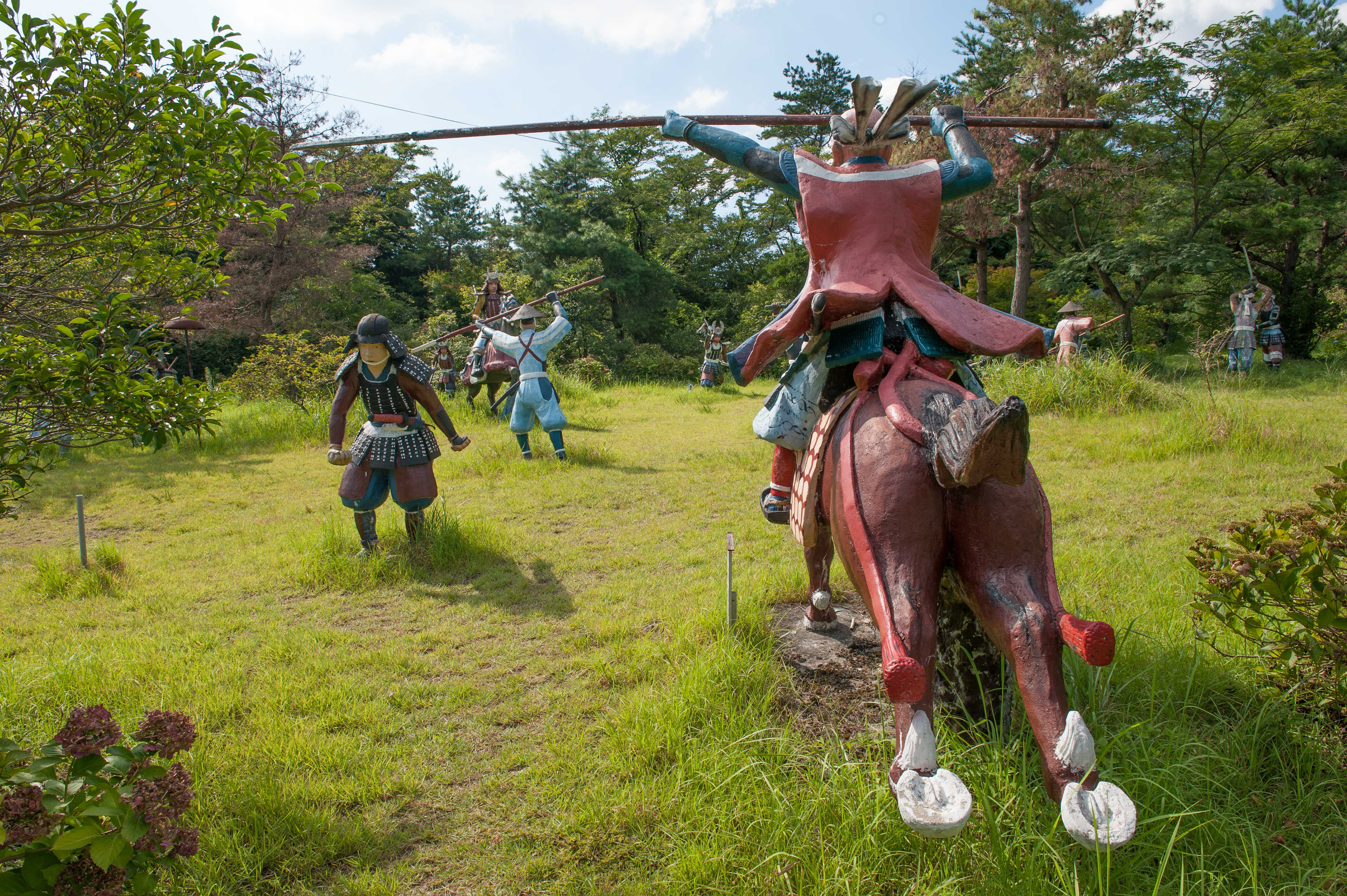 A horse soldier storms through a field at The Immersion Museum — Sekigahara War Land. | STEPHEN MANSFIELD