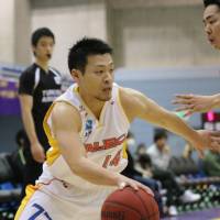 Sendai 89ers guard Fumiya Sato, seen in a file photo, put 10 points on the board in the visitors\' win over the Iwate Big Bulls on Saturday. | KAZ NAGATSUKA