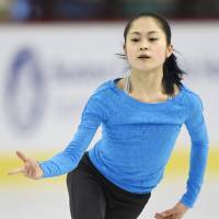 Two-time national champion Satoko Miyahara, seen here at practice on Monday, will try to win her first world title this week in Boston. | KYODO