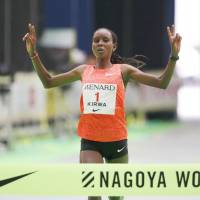 Eunice Jepkirui Kirwa crosses the finish line in first place to defend her title at the Nagoya Women\'s Marathon. | KYODO