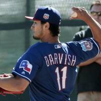 Rangers right-hander Yu Darvish pitches on Wednesday in Surprise, Arizona. | KYODO