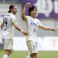 Sanfrecce Hiroshima striker Hisato Sato celebrates after scoring his 158th career J1 goal in Sunday\'s 1-1 draw with Nagoya Grampus. | KYODO