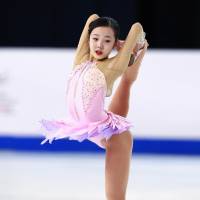 Marin Honda competes in the short program at the world junior championships in Debrecen, Hungary, on Friday night. Honda is second heading into Saturday\'s free skate. | KYODO