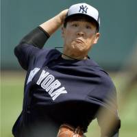 Yankees starter Masahiro Tanaka tossed two innings of two-run ball against the Pittsburgh Pirates on Thursday. | KYODO