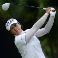 South Korea\'s Amy Yang hits a shot during the second round of the HSBC Women\'s Champions on Friday in Singapore. | AFP-JIJI