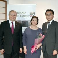 Lithuanian Minister of Agriculture Virginija Baltraitiene (center) poses with Vice Agriculture, Forestry and Fisheries Minister Hiromichi Matsushima (right) and Lithuanian Ambassador Egidijus Meilunas at a presentation promoting Lithuanian agriculture and food products at the Lithuanian Embassy in Tokyo on March 8. | LITHUANIA EMBASSY